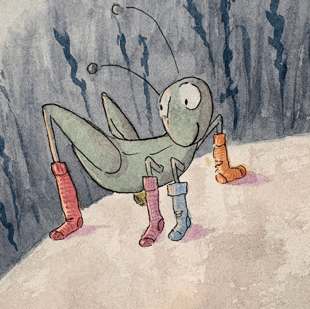 A little cricket wearing mismatched socks